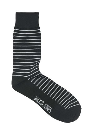 Calzino nero alla caviglia con strisce orizzontali bianche e testo "JACK & JONES" sulla suola, bordo a coste nella parte superiore.