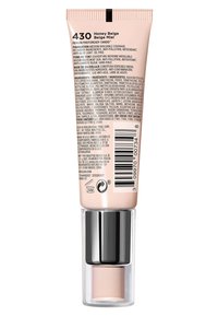 Tube de fond de teint Revlon Photoready Candid ; couverture moyenne modulable ; couleur beige doré ; fini mat ; accents argentés ; liste détaillée des ingrédients au dos.
