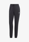 ESSENTIALS LINEAR CUFFED - Pantalones deportivos - black/white