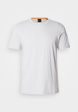 T-shirt bianco a maniche corte realizzato in morbido cotone, con scollatura tonda e discreto logo in bianco abbinato sul davanti.