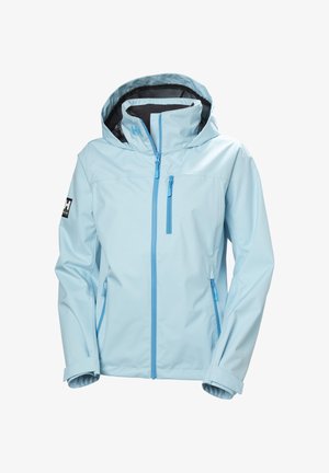 Lichtblauwe waterdichte jas met capuchon, voorzien van een voorkant met rits, twee zijzakken en een kenmerkend logo op de mouw. Gladde textuur.