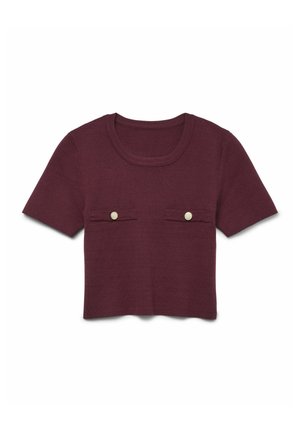 Kortärmad, bordeauxstickad topp med rund halsringning och två små framfickor prydda med guldknappar. Mjuk struktur, cropped design.