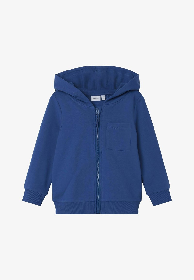 Sweat à capuche pour tout-petit bleu avec fermeture éclair à l'avant, capuche, manches longues, poignets et ourlet côtelés, et une poche poitrine unique.