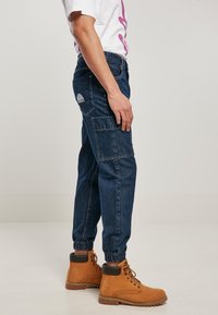 Southpole WITH CARGO POCKETS - Jeans Relaxed Fit - indigo raw