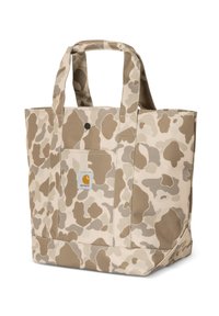 Beżowa torba tote z płótna w kamuflażowym wzorze, z dwoma solidnymi uchwytami i widoczną naszywką z logo. Posiada przednią kieszeń z zapięciem na guzik.