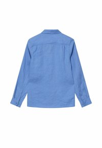 Šviesiai mėlyna ilgomis rankovėmis marškiniai, išdėstyti plokščiai, matomi nugarine puse, su smailia apykakle ir užsegamais rankogaliais.