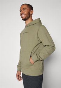 Helly Hansen CORE - Sudadera - green
