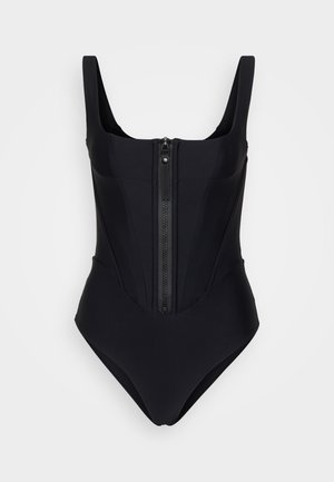 Čierne jednodielne plavky s širokými ramienkami, predným zipsom a konštrukčným panelovým dizajnom. Vyrobené z hladkej, elastickej látky.