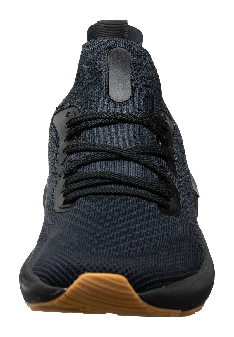 Scarpa atletica da uomo con tomaia in maglia blu navy, lacci neri e suola in gomma con suola in gomma per una maggiore trazione. Design elegante e texture resistente.