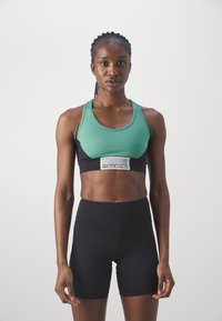 Nebbia WOMENS - Športni modrček s srednjo podporo - green