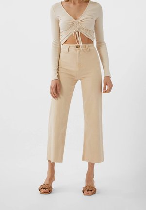 Flared jeans - beige