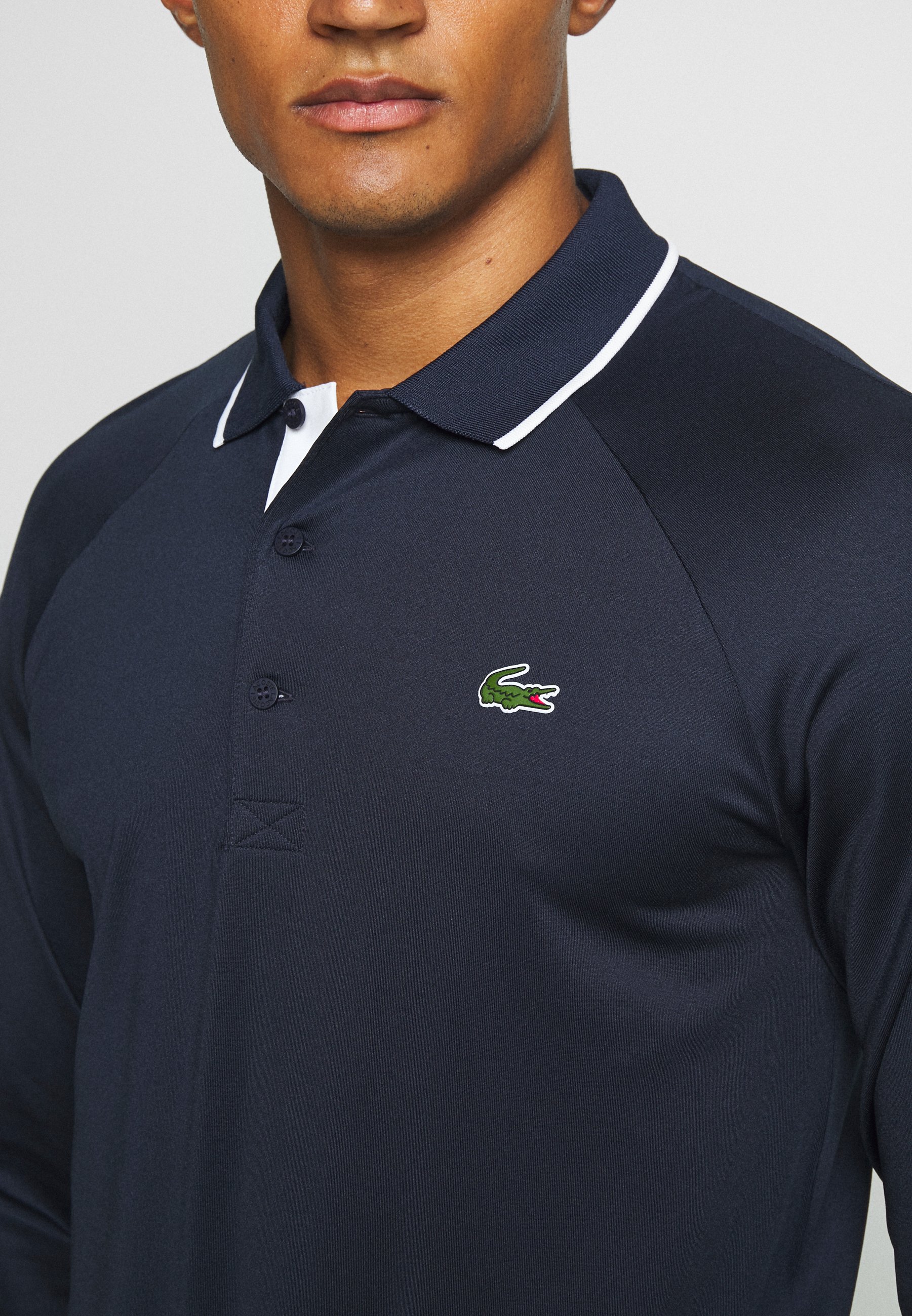 lacoste sport polo