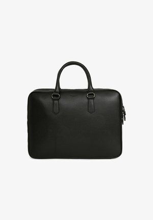 Black leather briefcase with a textured finish, featuring dual top handles, a zip closure, and minimalist design. No visible logo or accents.