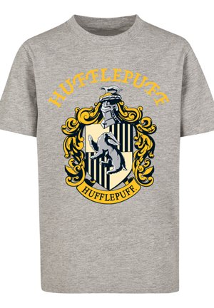 Gray t-shirt with yellow and black Hufflepuff crest featuring a badger, decorative flourishes, a knight's helmet, and the text "HUFFLEPUFF."