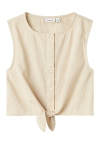 Haut sans manches beige en tissu texturé, avec une patte de boutonnage à l'avant et un nœud noué à l'ourlet. Design simple et décontracté.