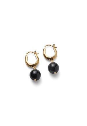 Gold hoop earrings with hammered texture, each featuring a single hanging shiny black spherical bead.