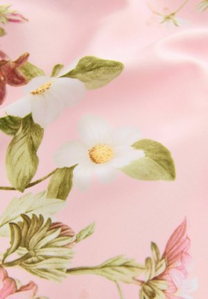 Floral fabric featuring pastel pink background, white flowers with yellow centers, and green leaves, creating a soft, textured pattern.