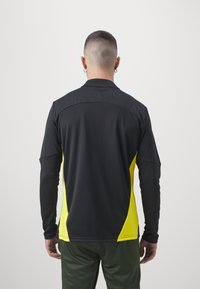 Puma BVB BORUSSIA DORTMUND TRAINING 1/4 ZIP - Sporto klubų atributika - black/faster yellow
