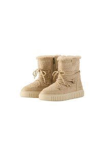 Beige Stiefel mit einem Obermaterial aus strukturiertem Stoff und einem Kragen aus Kunstfell, mit einem Reißverschluss und Schnürdetails an der Vorderseite. Chunky Gummisohle.