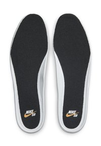 Crne teksturirane uloške s bijelim rubom, koji sadrže zlatni Nike SB logo na svakom ulošku za identifikaciju.
