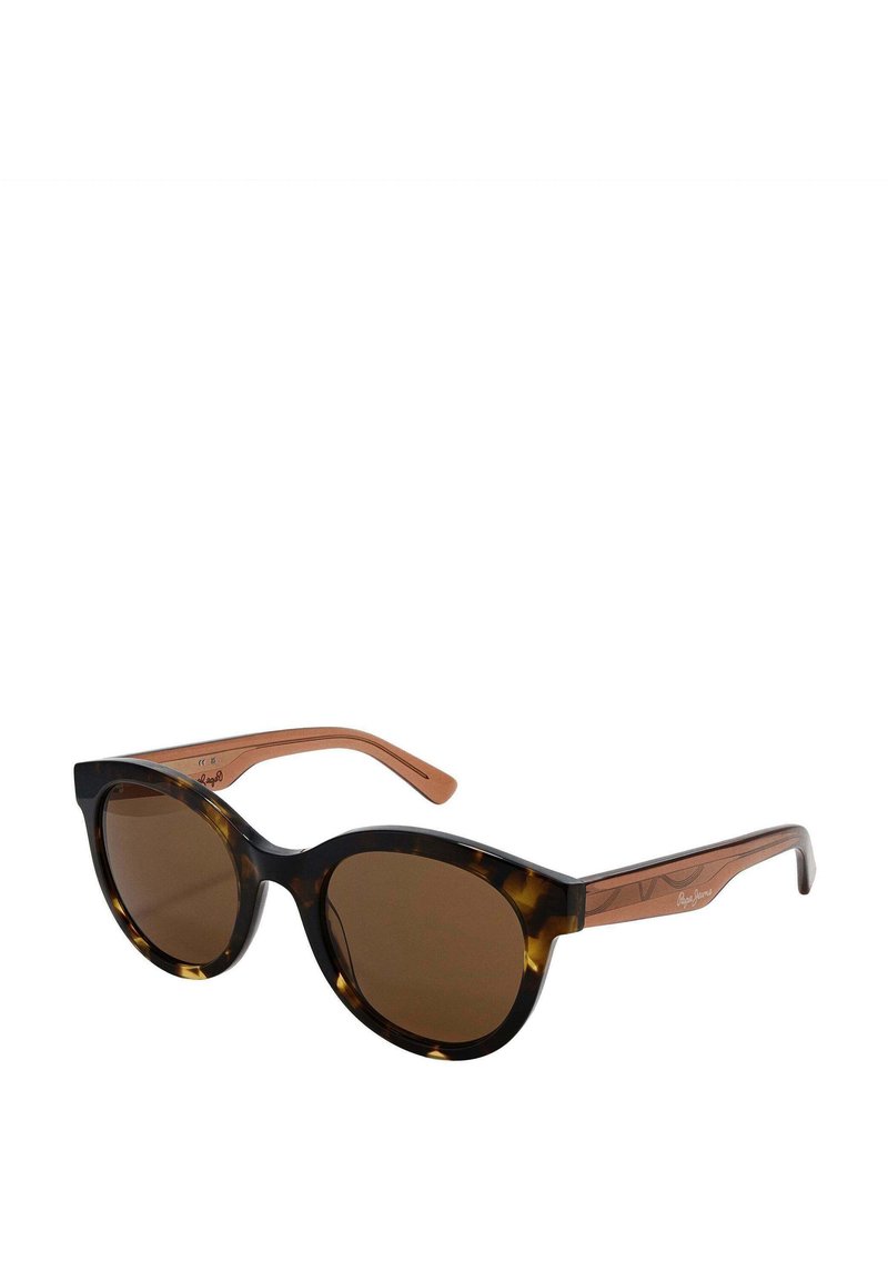 Gafas de sol de estilo gato con montura de carey oscuro y lentes marrones. Las patillas presentan un color marrón claro en contraste con acentos geométricos.