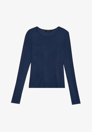 Námořnická modrá svrchní košile s dlouhým rukávem z měkké tkaniny, má kulatý výstřih a ploché švy podél rukávů, s uvolněným střihem.