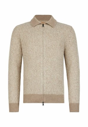 Beige stickad cardigan med dragkedja, ribbat mönster och kontrasterande krage. Har långa ärmar och en figurnära midja.