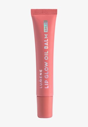 Tube de baume à lèvres Lumene Lip Glow Oil en corail rose avec SPF 30, debout sur un fond blanc.