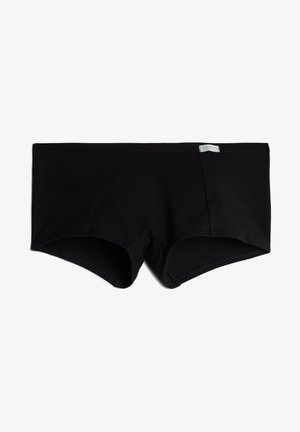 Black cotton boxer briefs with a seamless design, featuring a soft waistband and stitched edges for comfort and durability.