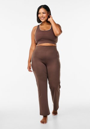 AUSGESTELLTE MIT KONTRASTPASPELIERUNG - Tracksuit bottoms - hot fudge