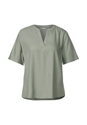 Lichtgroene blouse met korte mouwen en een V-hals, gemaakt van zachte stof, met een relaxed fit en een iets gebogen zoom.