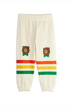 Cream-colored sweatpants with elastic ankles and a drawstring waistband feature bear graphics and multicolored horizontal stripes.
