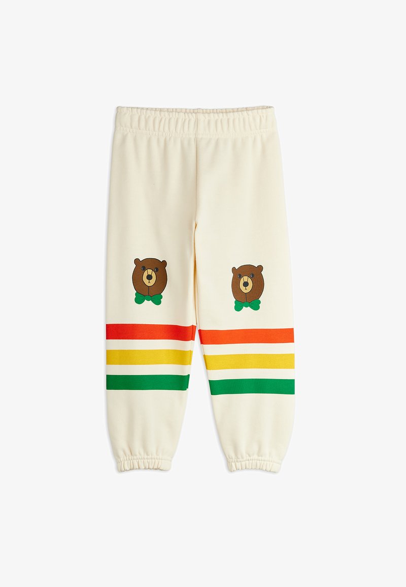 Krémové tepláky s elastickými kotníkmi a sťahovacím pásom s potlačou medveďov a viacfarebnými horizontálnymi pruhmi.