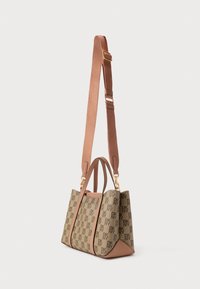Brown patterned handbag with gold hardware, dual handles, and a detachable shoulder strap. Textured material and structured shape.