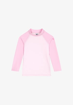 Rash guard à manches longues en rose clair, avec une texture côtelée sur le corps et des manches raglan roses unies. Col rond.