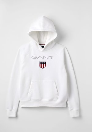 Biała bluza z kapturem wykonana z bawełnianej mieszanki materiałów, z kieszonką typu kangur, ściągaczami przy rękawach, kapturem ze sznurkiem i wyszywanym logo "GANT" z tarczą.