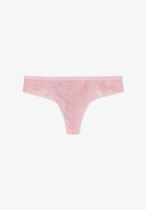 Pink lace thong with intricate web-like pattern and delicate edges, featuring a soft waistband and sheer texture.