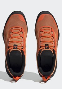 Adidas Terrex EASTRAIL 2 - Hiking shoes - impact orange/coral fusion/core black