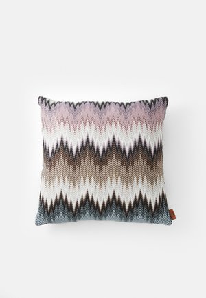 Rectangle decorative pillow with a zigzag pattern in shades of pink, white, brown, and blue, made of a textured fabric.