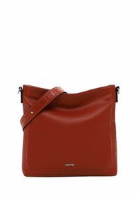Red leather crossbody bag with a textured finish, featuring a soft top edge, a logo-embossed strap, and a minimalist design.