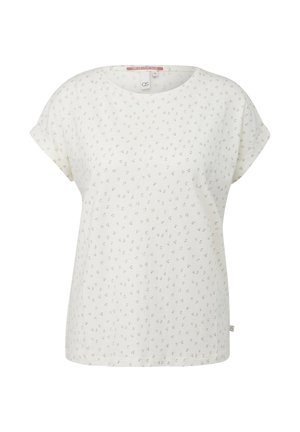 Blouse blanche à manches courtes avec petit imprimé floral dispersé, encolure ronde et coupe décontractée.