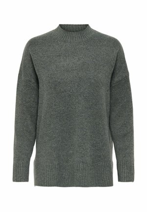 Suéter verde de gran tamaño con un cuello redondo acanalado, mangas largas y tela de punto texturizada. Ribete acanalado notable en el dobladillo y los puños.