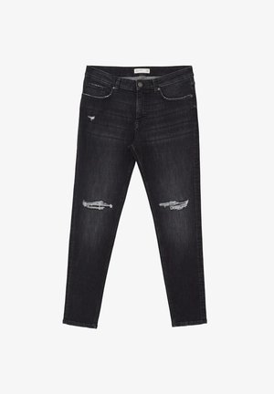 Jean en denim noir avec une coupe slim, présentant des détails déchirés aux genoux, des poches standards et des coutures contrastées le long de la taille.