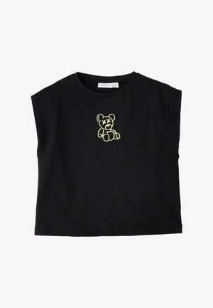 Canotta nera con un piccolo contorno neon giallo di un orsetto con gli occhi sbarrati sul petto.