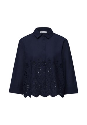 Navy blue button-up blouse with collar, long sleeves, and embroidered eyelet detailing along the lower half and scalloped hem.