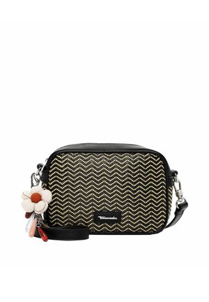 Czarna torebka listonoszka z beżowym wzorem w zygzak, materiałowym kwiatowym zawieszkiem oraz odpinanym skórzanym paskiem z srebrnymi okuciami.