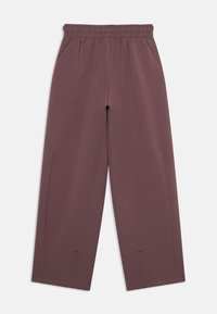 Ελαστικό, μπορντό παντελόνι με ελαστική μέση, πλαϊνές τσέπες και φαρδιά γραμμή. Λείος υφή και ελάχιστες ραφές.