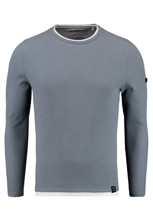 Lange mouwen shirt in lichtblauw geribbeld materiaal met een witte ronde hals. Voorzien van een merklabel aan de linker onderzoom.