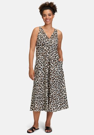 Leopardenmuster Midi-Kleid mit V-Ausschnitt, ärmellosem Design, seitlichen Taschen und fließender Silhouette. Hergestellt aus leichtem Stoff.