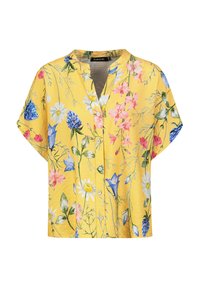 Gelbe kurzärmlige Bluse mit floralem Druck, bestehend aus blauen und rosa Blumen, einem V-Ausschnitt und vorderen Knöpfen. Hergestellt aus leichtem Stoff.